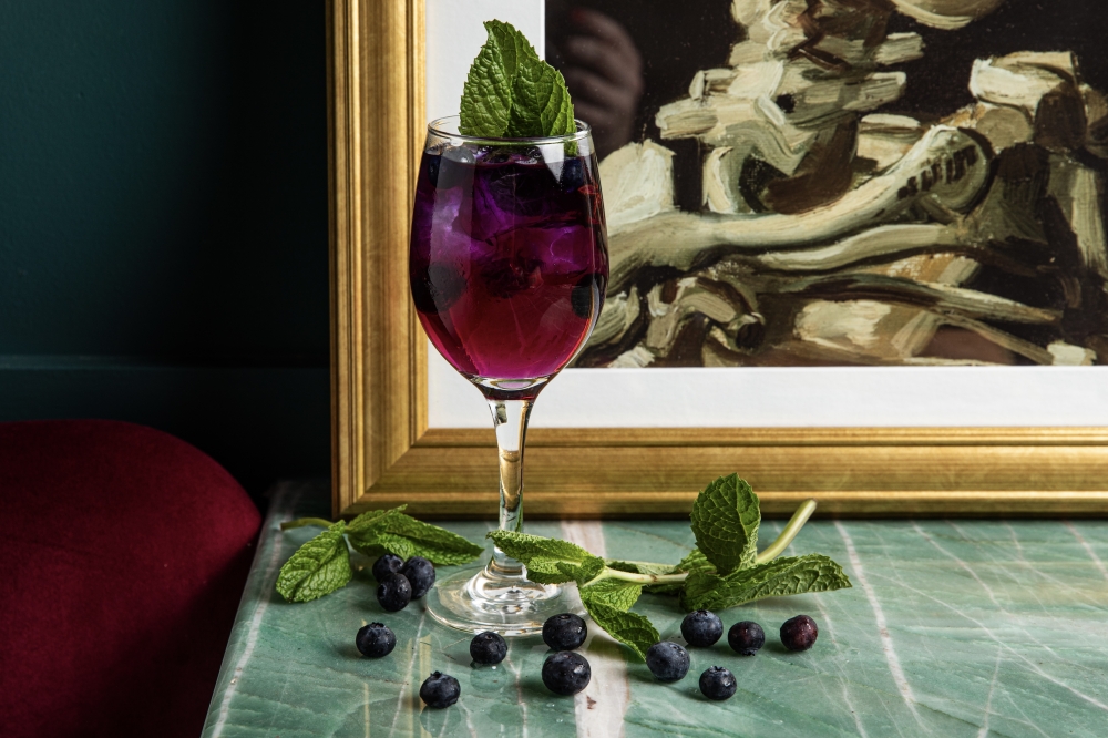 The Houstonian is made with butterfly pea gin, Fever-Tree tonic and spices. (Courtesy Becca Wright)