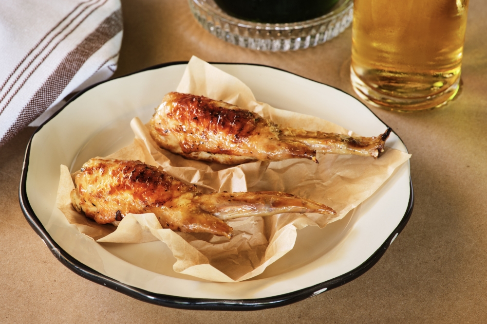Le Calamar, owned by Claudia Lee and Richard Hargreave, serves startes such as the chicken wing a la Koffman. (Courtesy Clay Grier)