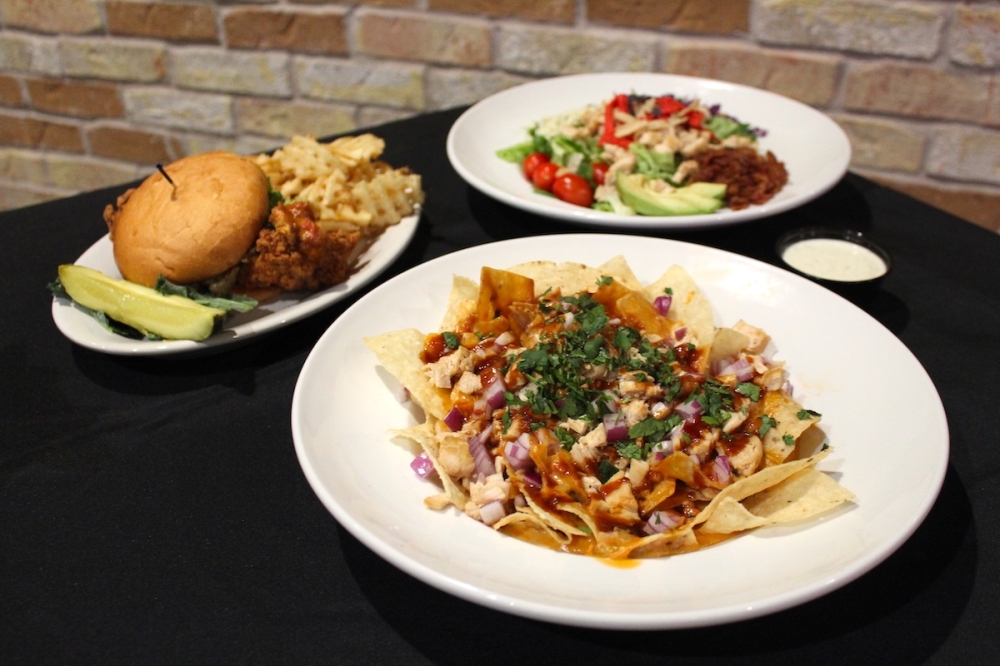 Pluckers serves chicken wings, burgers, appetizers, salads, sandwiches and more. (Sarah Hernandez/Community Impact)