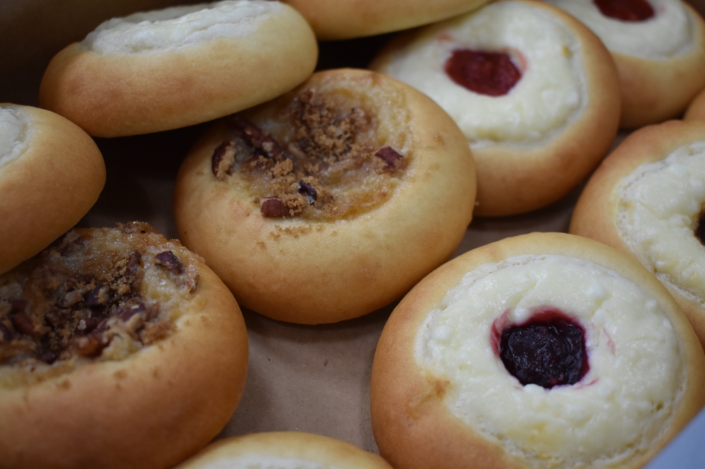 AllyAnne's Kolache Kitchen serves savory and sweet kolaches ($2.50-$5.30), including raspberry and cream and blueberry and streusel. (Julianna Washburn/Community Impact)