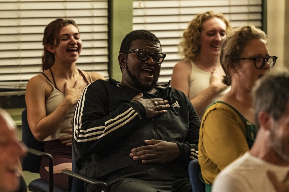 Stand-Up Comedy, Sit Down Yoga combines comedy, breath work, yoga and meditation in one wellness event. (Courtesy Stand-Up Comedy, Sit Down Yoga)