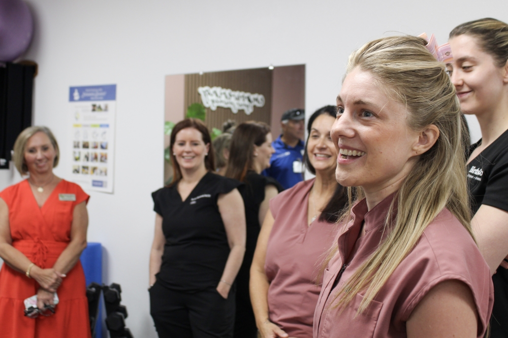 Katherine Melot (front, right) founder of BirthCo. Chiropractic + Wellness, said she hopes her clinic fills gaps in women's health. (Elisabeth Jimenez/Community Impact)