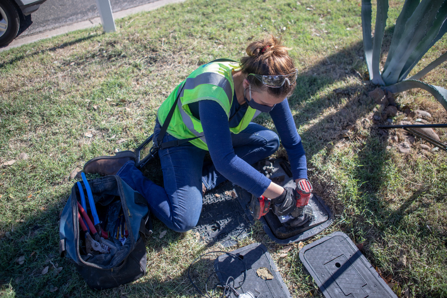 Person installing leak detection system