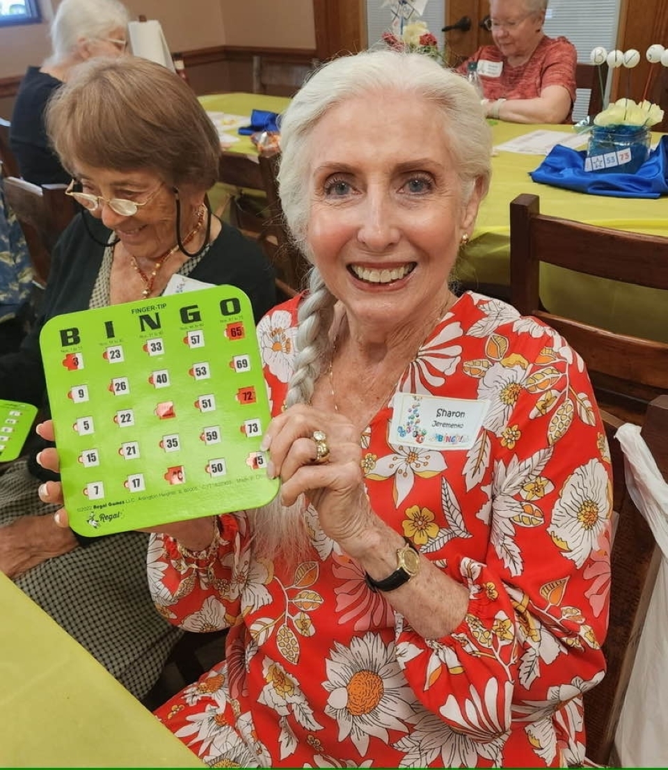Sharon Jeremenko enjoys an afternoon of bingo, prizes and lunch with members and guests. (Courtesy North Harris County American Association of University Women)