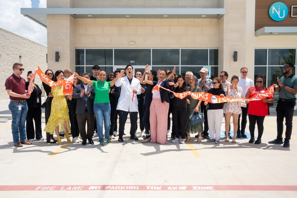 Missouri City Mayor Robin J. Elackatt, Mayor Pro Tem Sonya Brown-Marshall, Councilmember Lynn Clouser and community members gathered to celebrate the ribbon cutting of Harrison Dermatology on June 6. (Courtesy Missouri City)