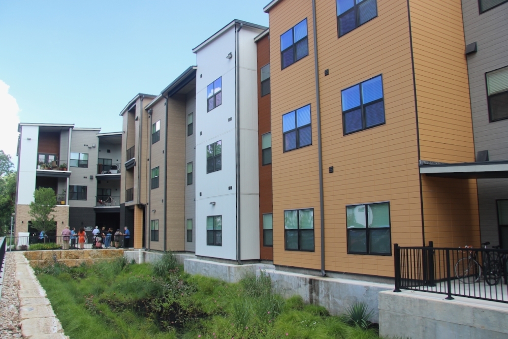 Nonprofit Imagine Art held a formal ribbon-cutting for the low-income Live Make Apartments in June. (Ben Thompson/Community Impact)