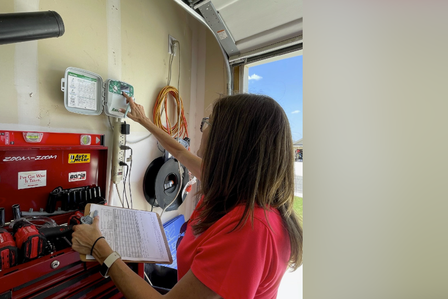 Woman helping family get utility assistance in New Braunfels