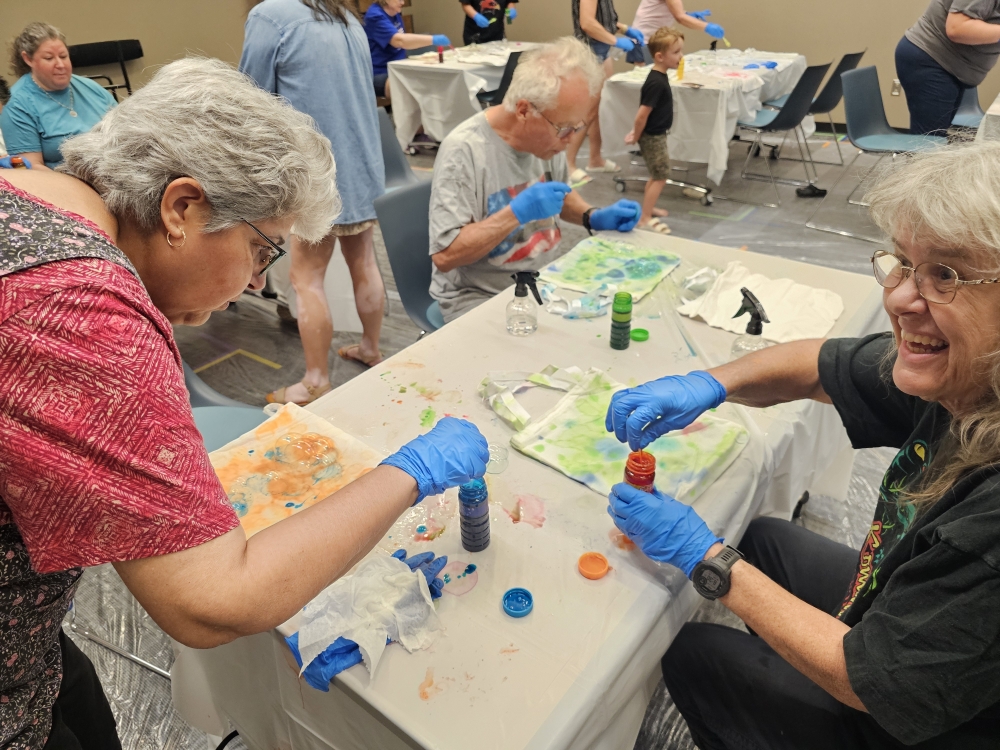 Adults painting at Boerne library events