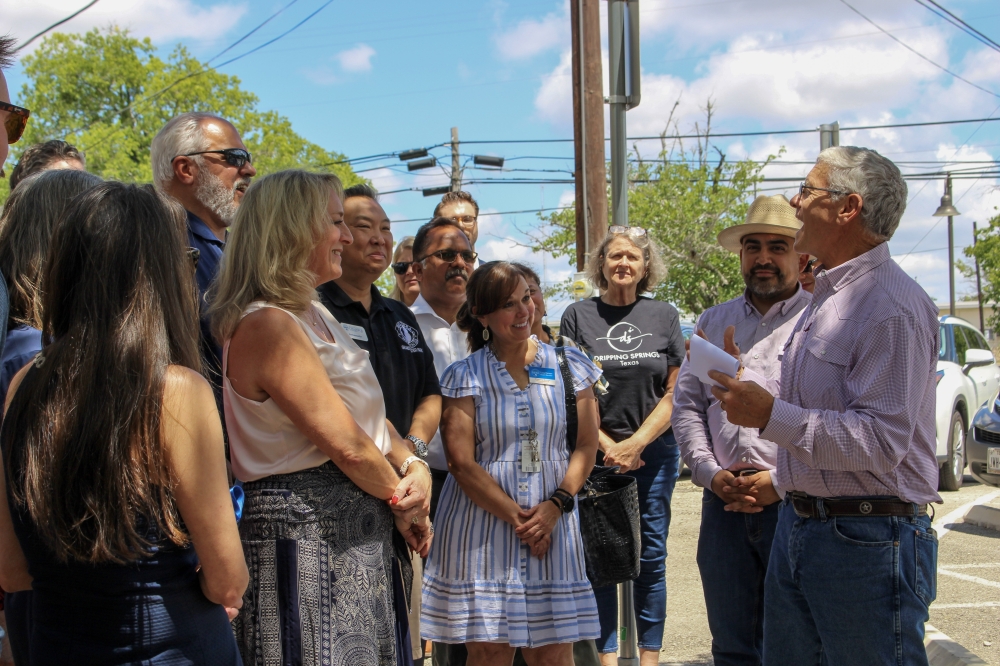 Bill Foulds gave a speech at a ribbon cutting marking the opening of the new Dripping Springs city hall building located on Mercer Street. (Elisabeth Jimenez/Community Impact)