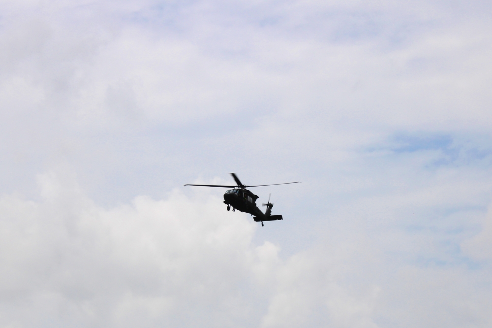 At 1:44 p.m. July 7, a helicopter was circling the San Gabriel River near the intersection of Hwy. 29 and I-35. (Anna Maness/Community Impact)