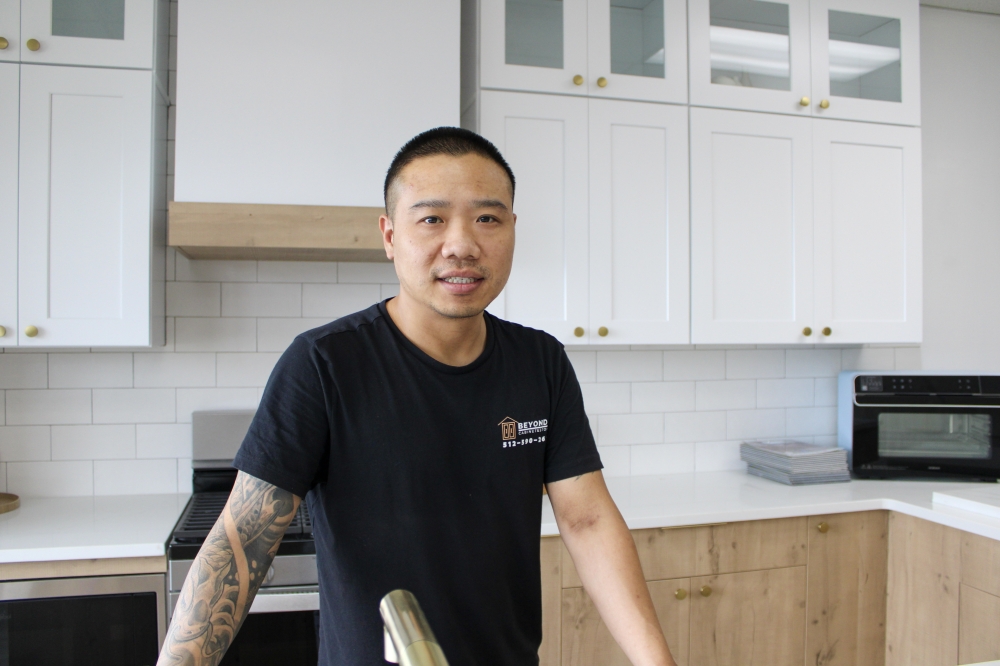 Owner Leo Zhu grew up surrounded by the cabinet industry and decided to open his own business after years of learning from family. (Dacia Garcia/Community Impact)