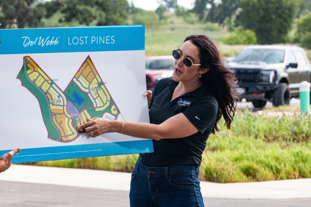 Ashley Ellis, vice president of sales at PulteGroup, discusses the three-phased approach of the Del Webb Lost Pines community (Joel Valley/Community Impact) 
