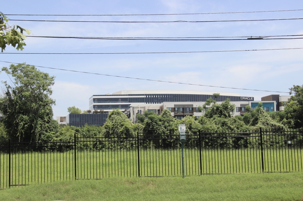 Oracle is looking to expand its Riverside campus with a new hotel development on a vacant lot. (Ben Thompson/Community Impact)