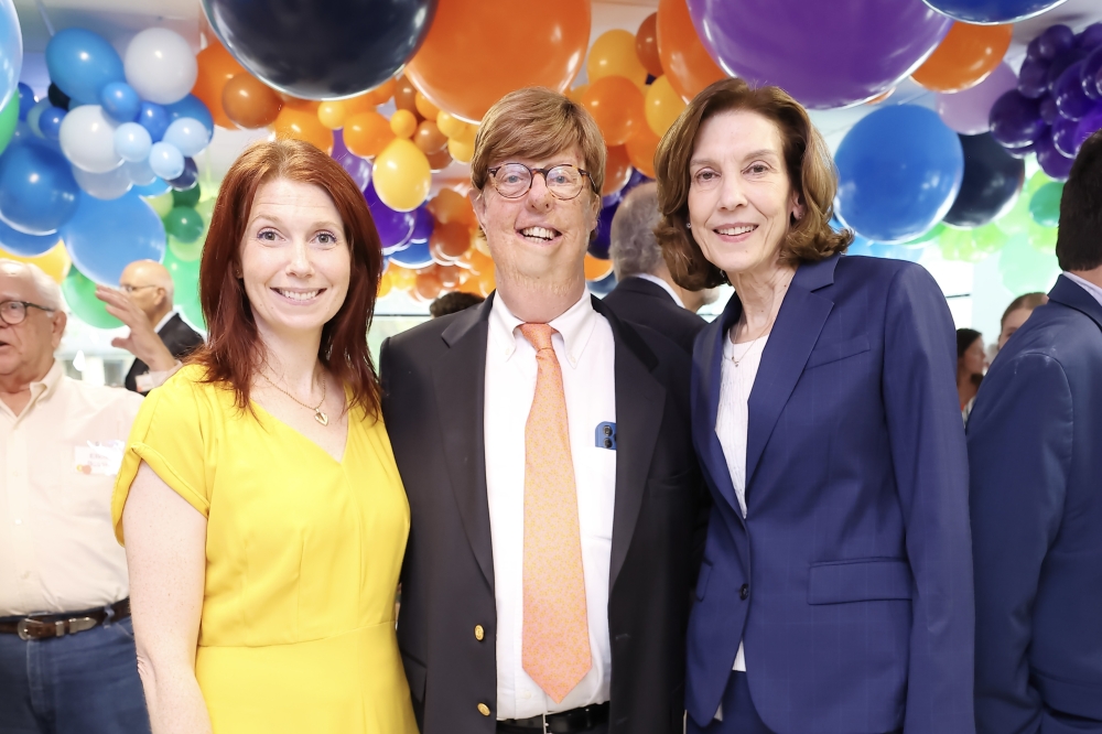 Temple Webber next to Junior League of Houston president Katie Doyle (left) and DePelchin CEO and president Jenifer Jarriel (right). (Courtesy of DePelchin Children's Center)