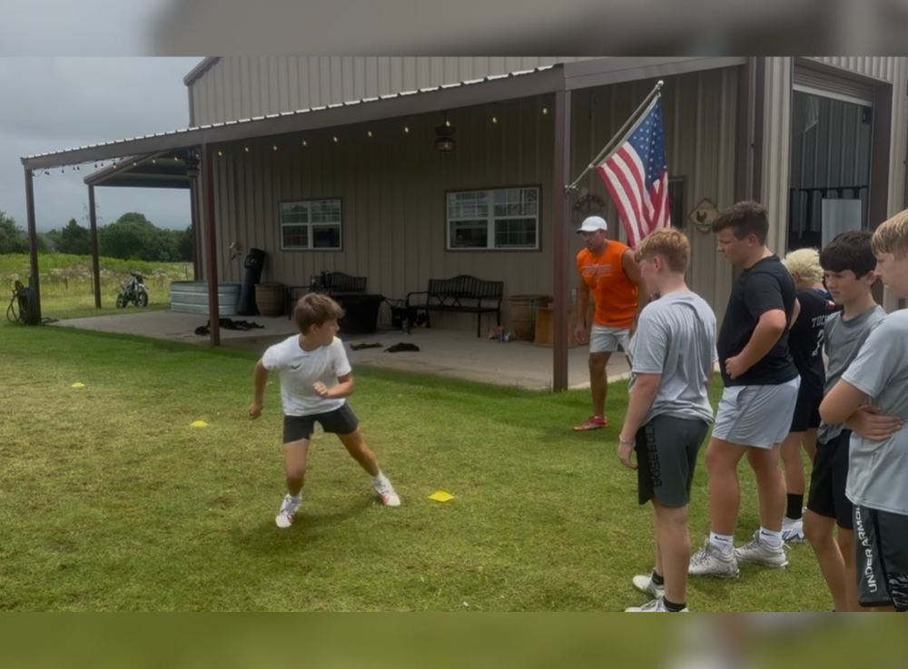 Athlete lifts weights at gym in Celina
