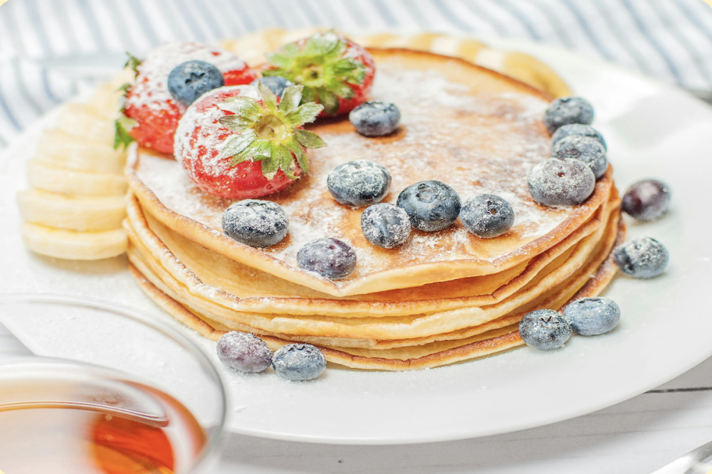 Sunny's serves an all-day brunch menu for breakfast, lunch, and dinner cravings, like the Mini Stack pancakes. (Courtesy Sunny's)
