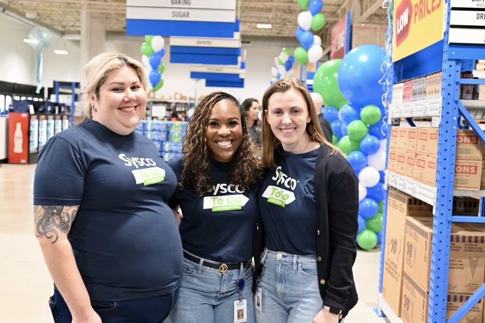 At Sysco's grand opening, attendees could try free samples, sign up for a free membership and win prizes in raffles and giveaways before the ribbon cutting. ( Roo Moody/Community Impact)