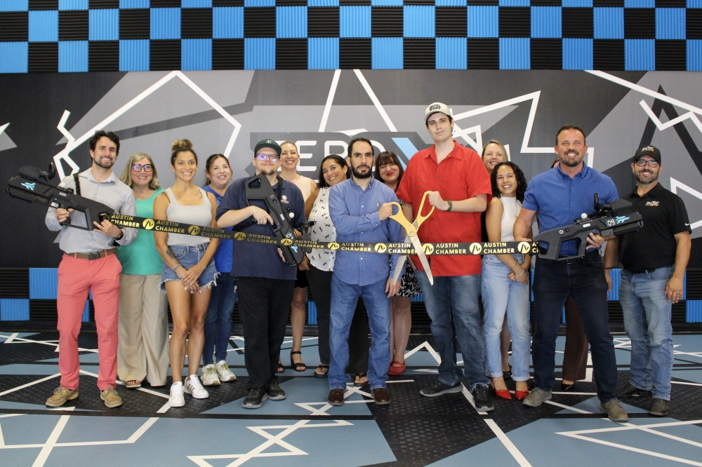 Zero Latency VR Austin owners Mohammad Edaibat and Zac Rucker celebrated the build out of their Southpark Meadows spot with a ribbon cutting July 31, in partnership with the Austin Chamber of Commerce. (Elisabeth Jimenez/Community Impact)