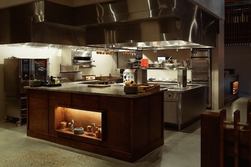 The restaurant has an open-kitchen layout where customers can watch the food preparation process. (Courtesy of Mayahuel)