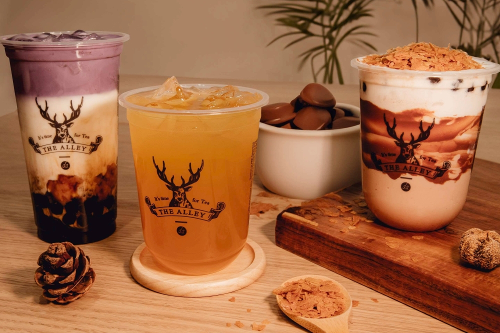 The dessert drink spot offers fruit and milk teas with tapioca pearls in a variety of flavors, such as matcha, ube taro and brown sugar, alongside pastries. (Courtesy The Alley)
