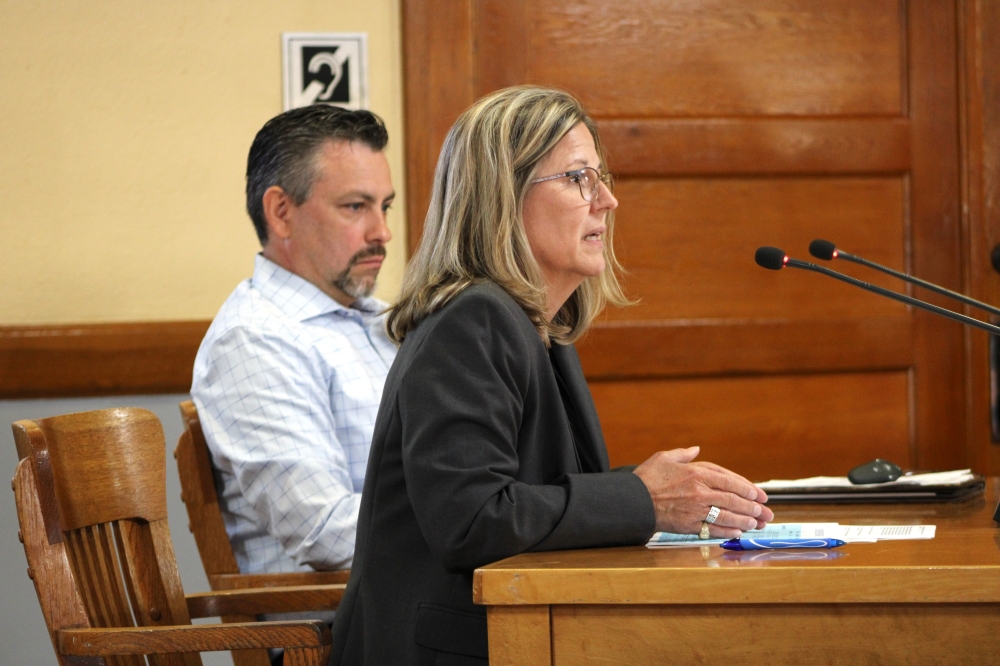 Tax Assessor and Collector Larry Gaddes (left) and County Auditor Julie Kiley discuss possible tax rates and revenue forecasts for the fiscal year 2025-26 budget. (Anna Maness/Community Impact)