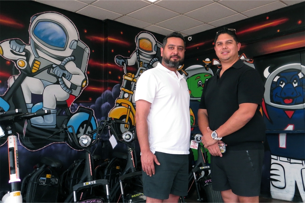 ERYD co-owners Mahmood Bitaraf and Abe Levitz stand inside their store located in Downtown Houston. (Kevin Vu/Community Impact)