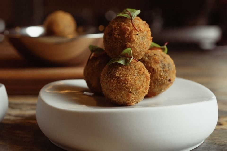 Mayahuel's beef carnitas croquettes are served with salsa taquera and cilantro lime aioli. (Courtesy of Mayahuel)