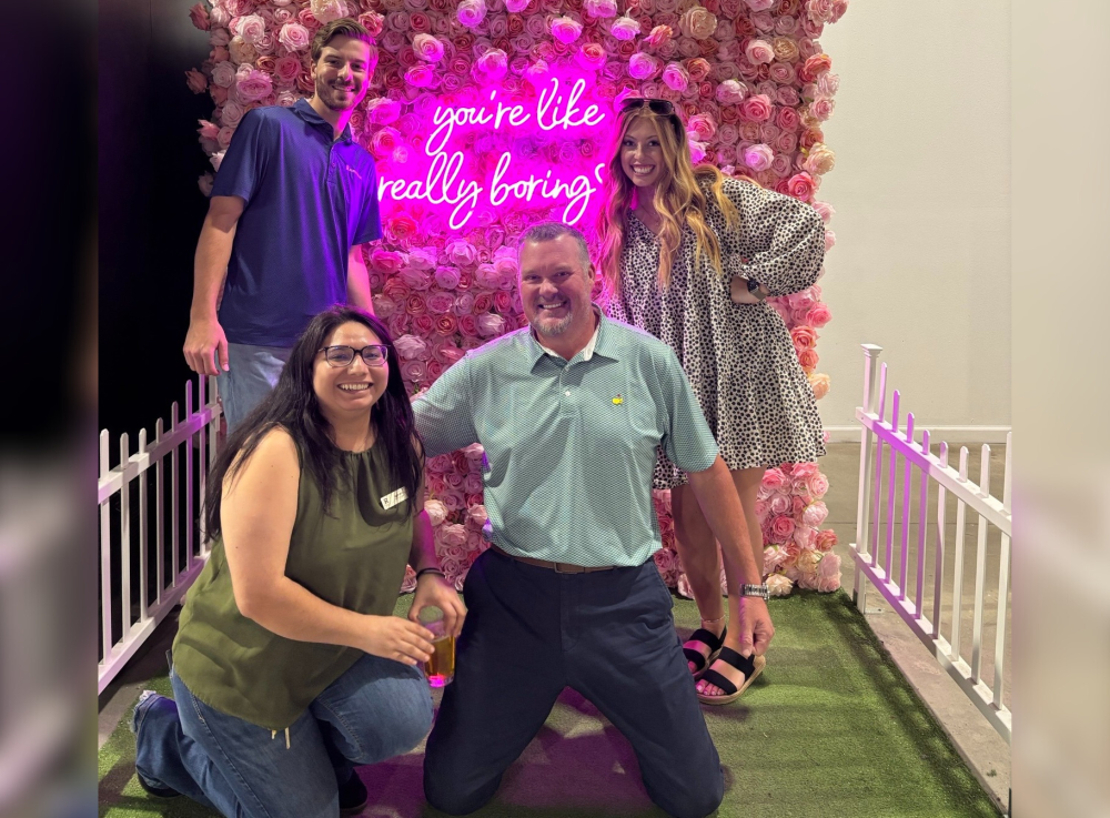 people pose at an event