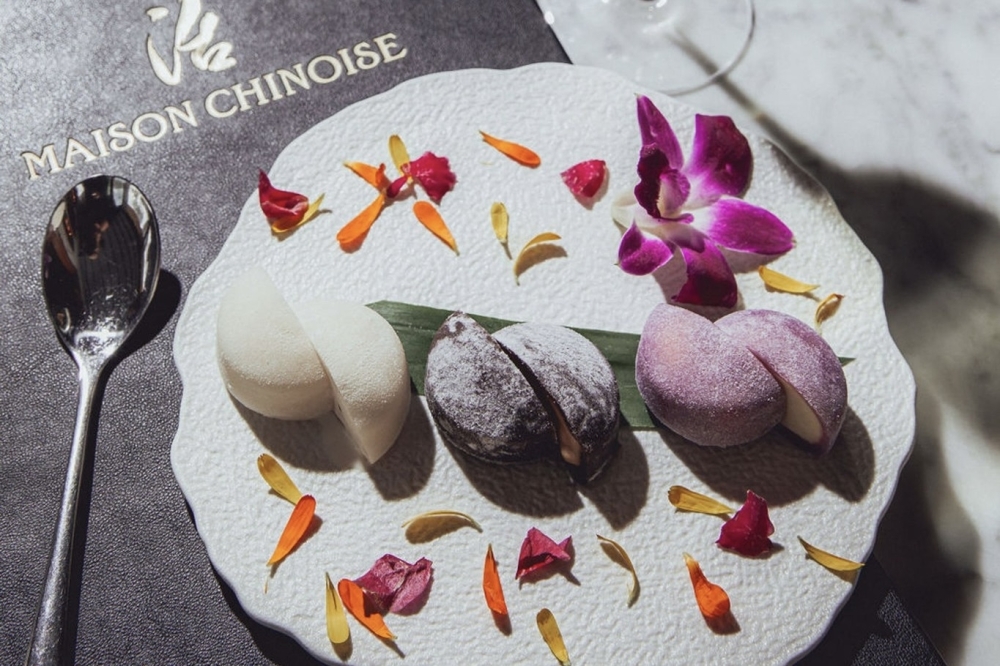 The restaurant's dessert menu features classic Mochi Ice Cream in three-piece seasonal flavors. (Courtesy Maison Chinoise via Facebook)