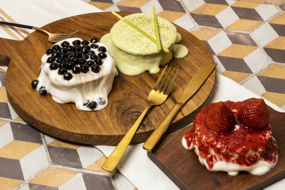 The menu features a selection of milk foam cakes. (Courtesy Feng Cha)