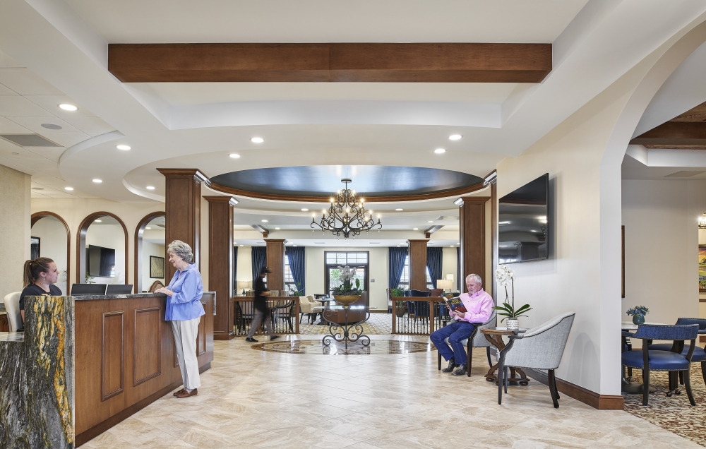 Senior living residents sitting in cafe