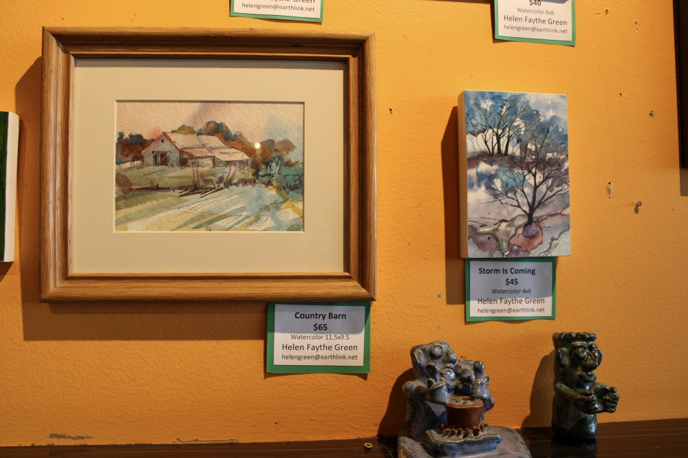 The restaurant supports local artists by showcasing their art inside its dining area where customers can purchase it. (Dacia Garcia/Community Impact)