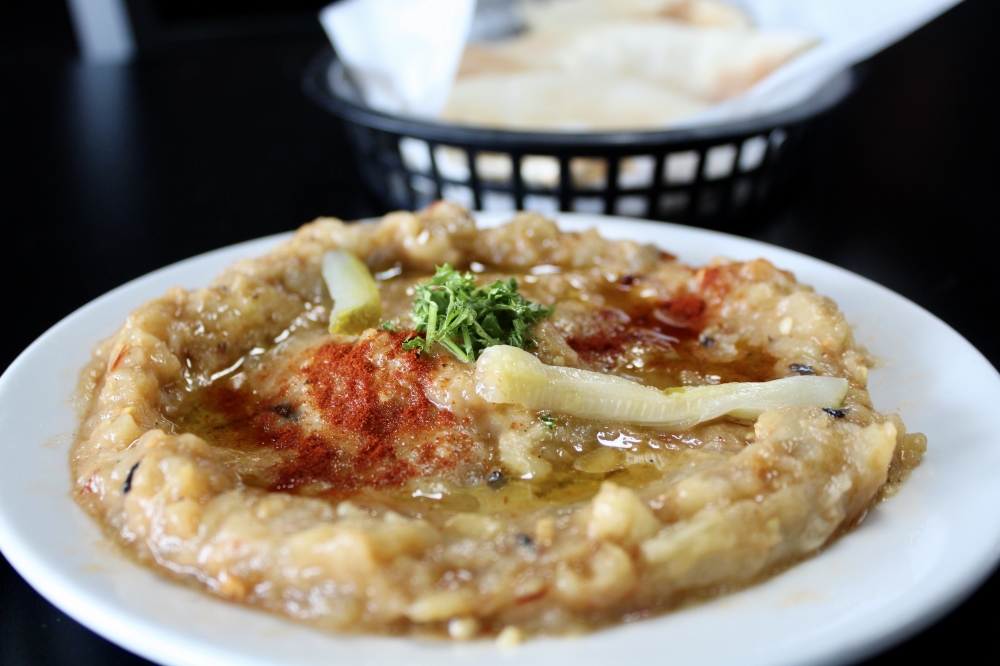 Baba Ganough ($4.99) consist of grilled eggplant pureed with tahini, olive oil and lemon juice. (Jovanna Aguilar/Community Impact)
