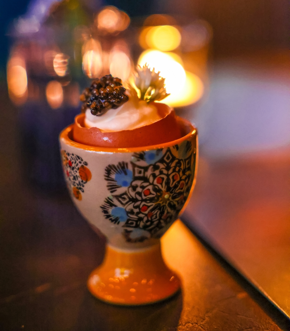 The Royal Egg will be one of Roya's menu mainstays, consisting of a savory egg custard with caviar, labneh and a chive blossom garnish. (Courtesy Hayden Walker/Roya) 