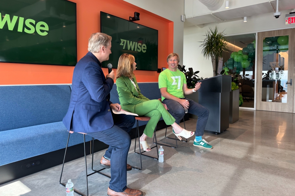 Austin Technology Council chair Ray Kunik, left, Opportunity Austin chief economic development officer Susan Davenport and Wise CEO Kristo Kaarmann discussesd THIS. (Brittany Anderson/Community Impact)