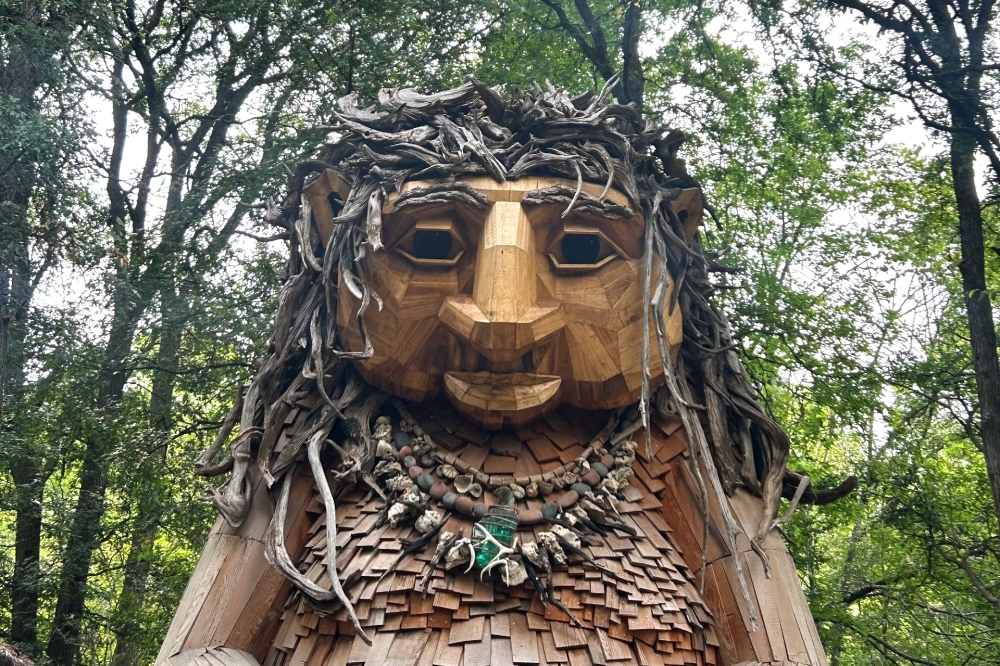 Malin's Fountain, the recycled-material troll by artist Thomas Dambo, stands near Kingsbury Commons in Pease Park, welcoming visitors to Austin’s historic green space. (Elle Bent/Community Impact)