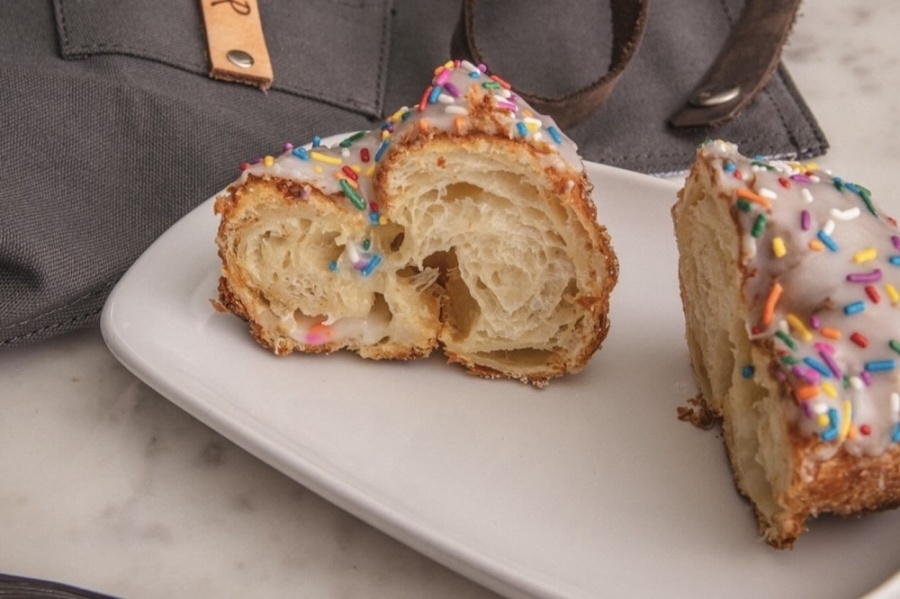 The franchise is known for its unique take on doughnuts, making them layered and flaky. (Courtesy Parlor Doughnuts)