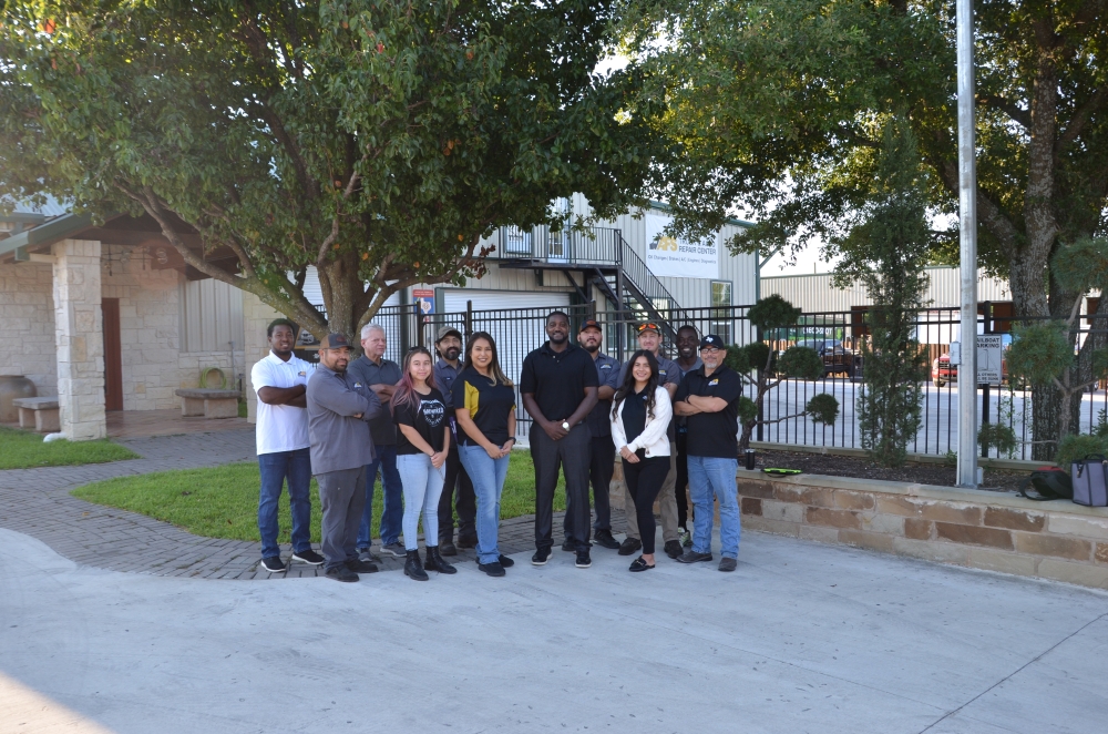 Pflugerville car repair shop team smiling