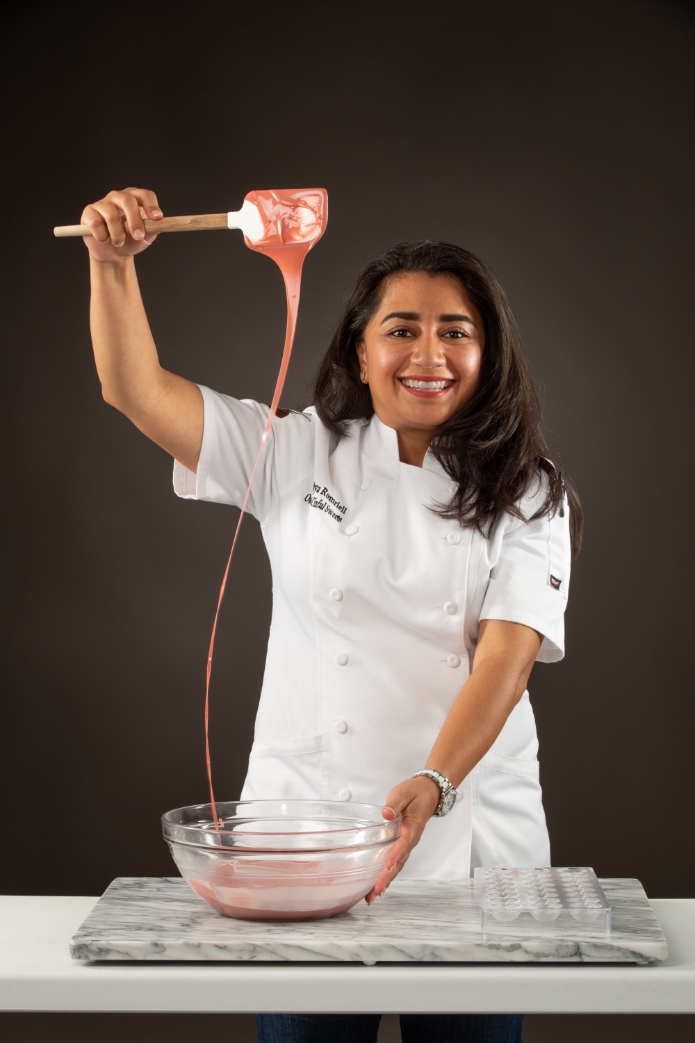 Owner and chocolatier Cinthya Romriell pivoted from a career in teaching after finding her love for baking and chocolate making. (Courtesy Cinful Sweets)
