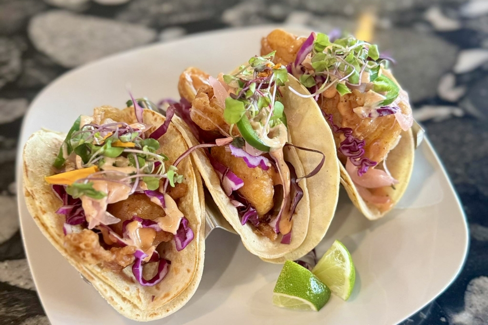 Welcome to the Oscar'sis known for its baja tacos ($15.50) made with flounder fish, grilled shrimp or fried avocado and garlic aioli sauce, red cabbage, pickled onions and jalapeño. (Courtesy Welcome to the Oscar's)