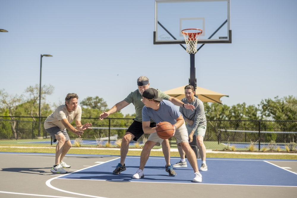 People playing basketball at master-planned community in Georgetown