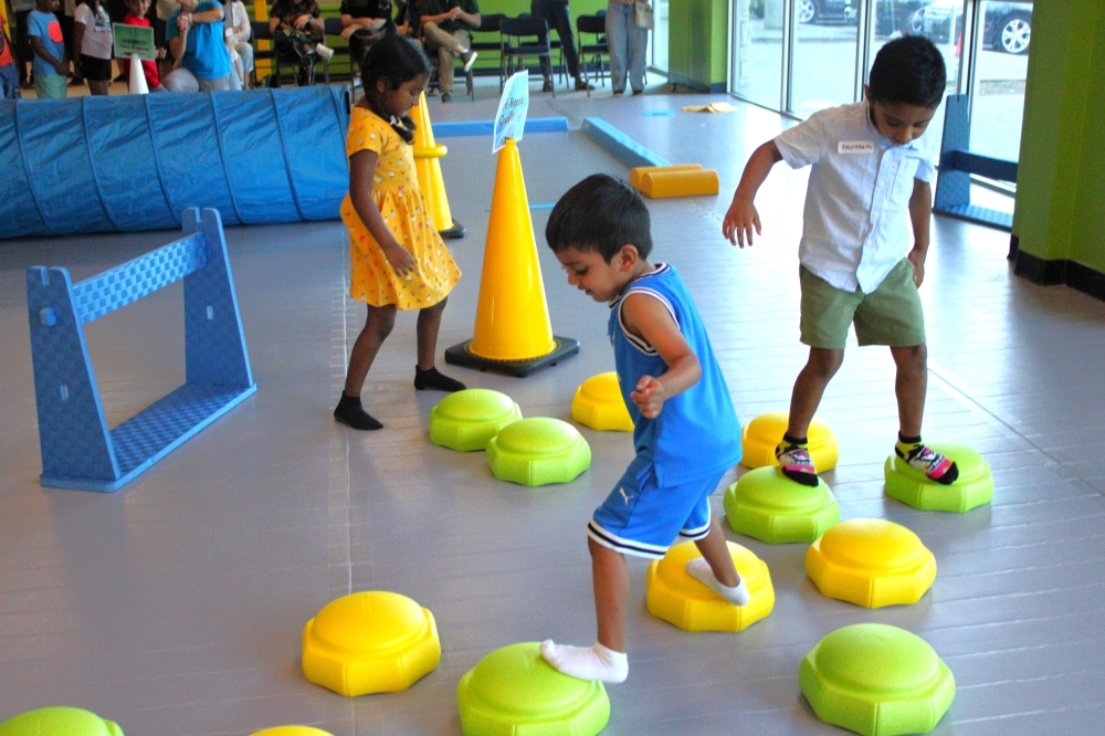 Kids playing in pe program Frisco