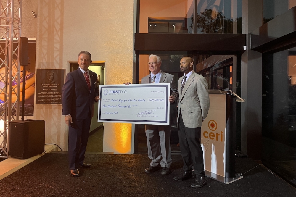 FirstDay Foundation donated $100,000 to GenATX. Pictured above is President and CEO of FirstDay Foundation and Board Chairman of CERI Kevin Dinnin (left), Austin Mayor Kirk Watson (middle) and CERI President Ian Forber-Pratt (right). (Sienna Wight/Community Impact)