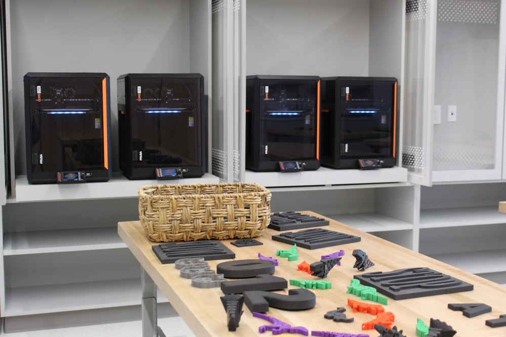 Students can use 3D printers in the makerspace area at Harmony Science Academy Georgetown. (Chloe Young/Community Impact)