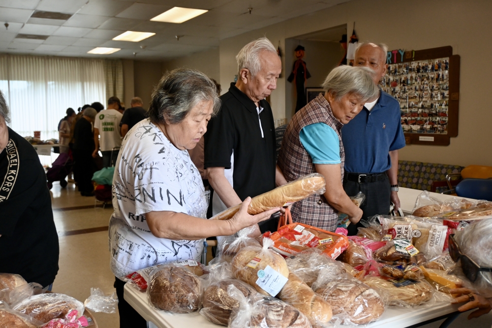 Participants at the pop-ups can choose which items to bring home. (Roo Moody/Community Impact)