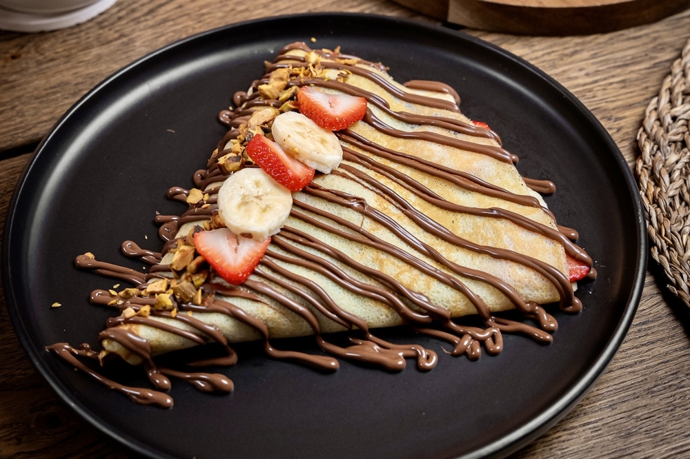 The Capri ($12.75) isa crepe with Nutella, strawberries, banana and pistachios. (Courtesy Daniel Vengoechea/Ruah Cafe)