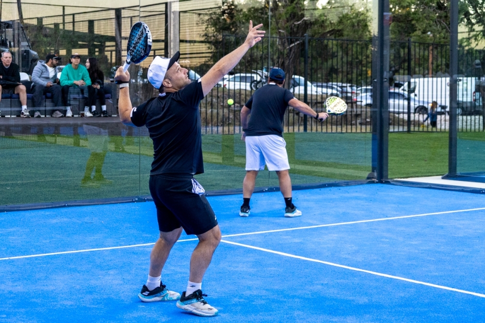 Professionals break in the John Newcombe Country Club's newest padel ball courts opened Oct. 29. (Ethan Thomas/Community Impact)