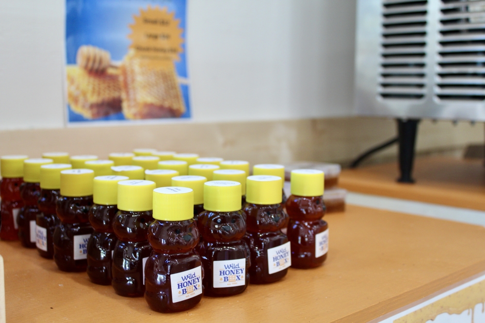 Wild Honey Box offers a variety of honey flavors packed in bear containers. (Jovanna Aguilar/Community Impact)