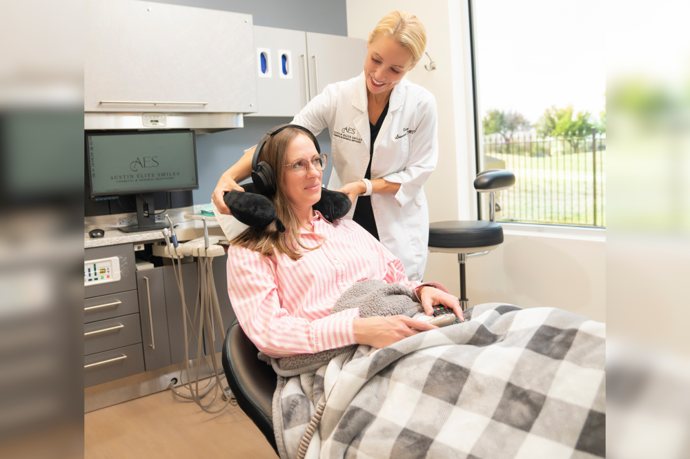 Austin dentist puts headphones on patient