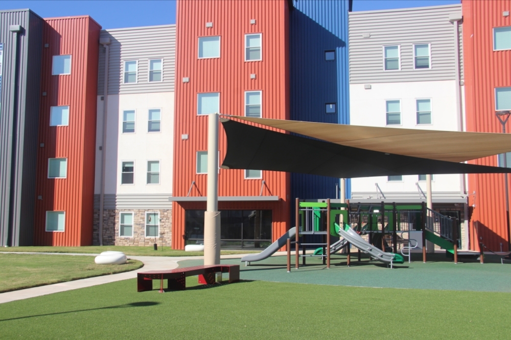 Libertad Austin features a community yard and playground area. (Ben Thompson/Community Impact)